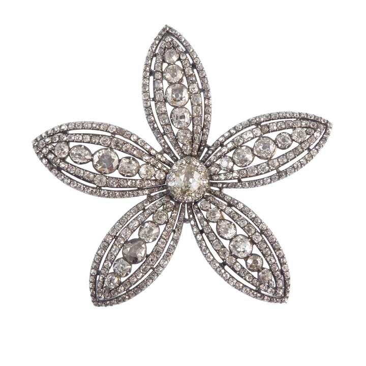 Cushion cut diamond five petal flowerhead brooch